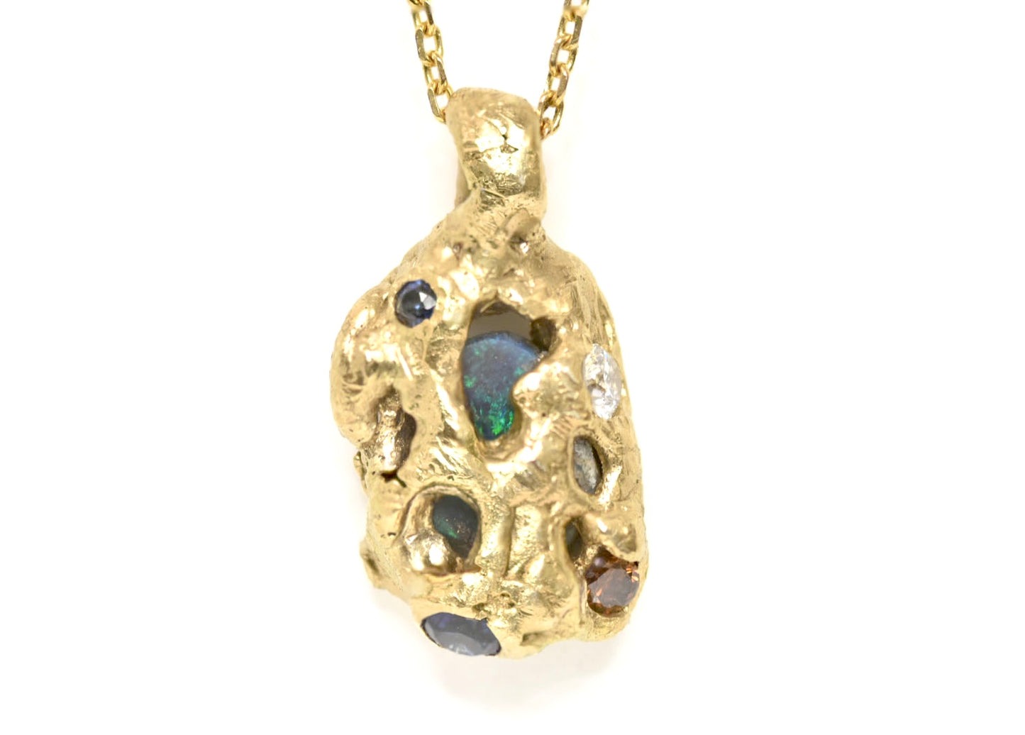 2.4 ct Black Opal, White Diamond, Cognac Diamond and Sapphire Ring. 18k Yellow Gold Pendant. Western Cliffs of Swanage.