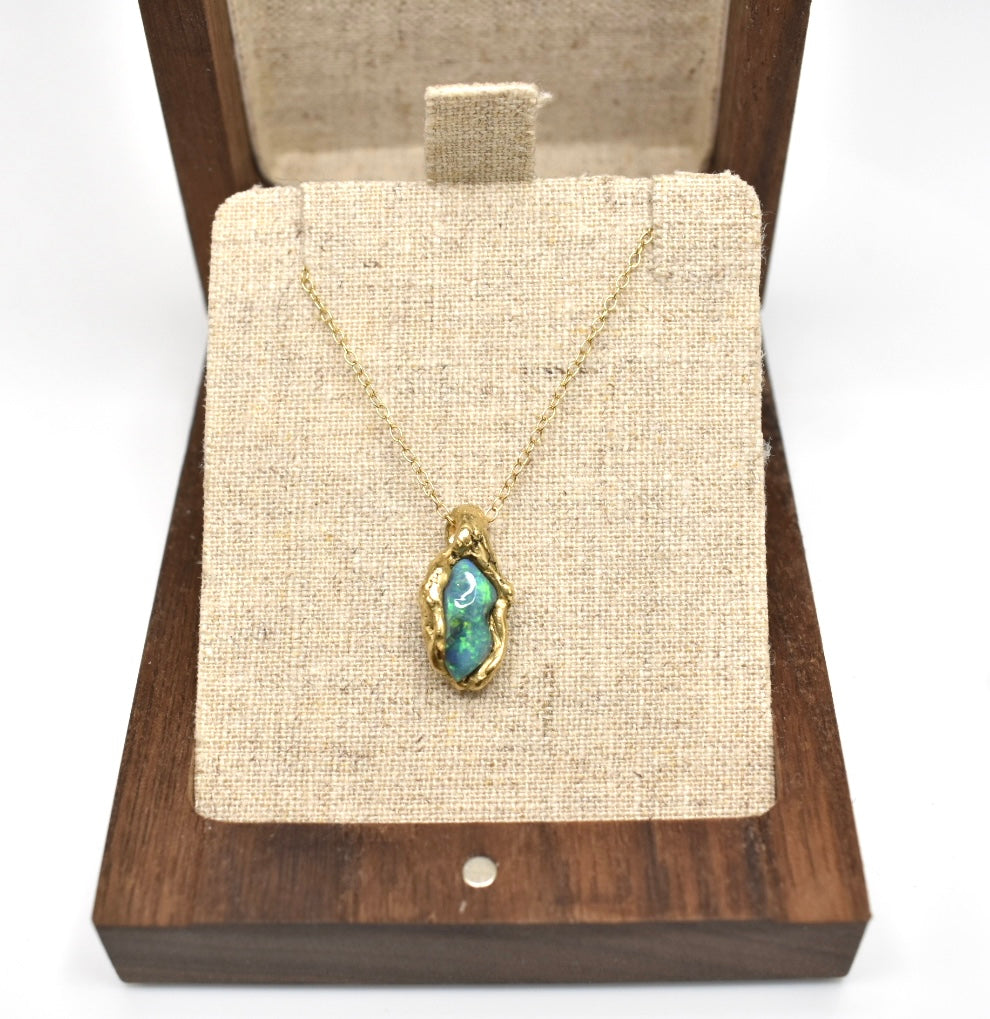 1.15ct Black Opal, White Diamond and Sapphire pendant, 18k Yellow Gold. St Ives, Cornwall.
