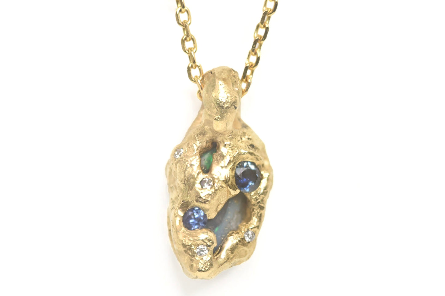 1.15ct Black Opal, White Diamond and Sapphire pendant, 18k Yellow Gold. St Ives, Cornwall.