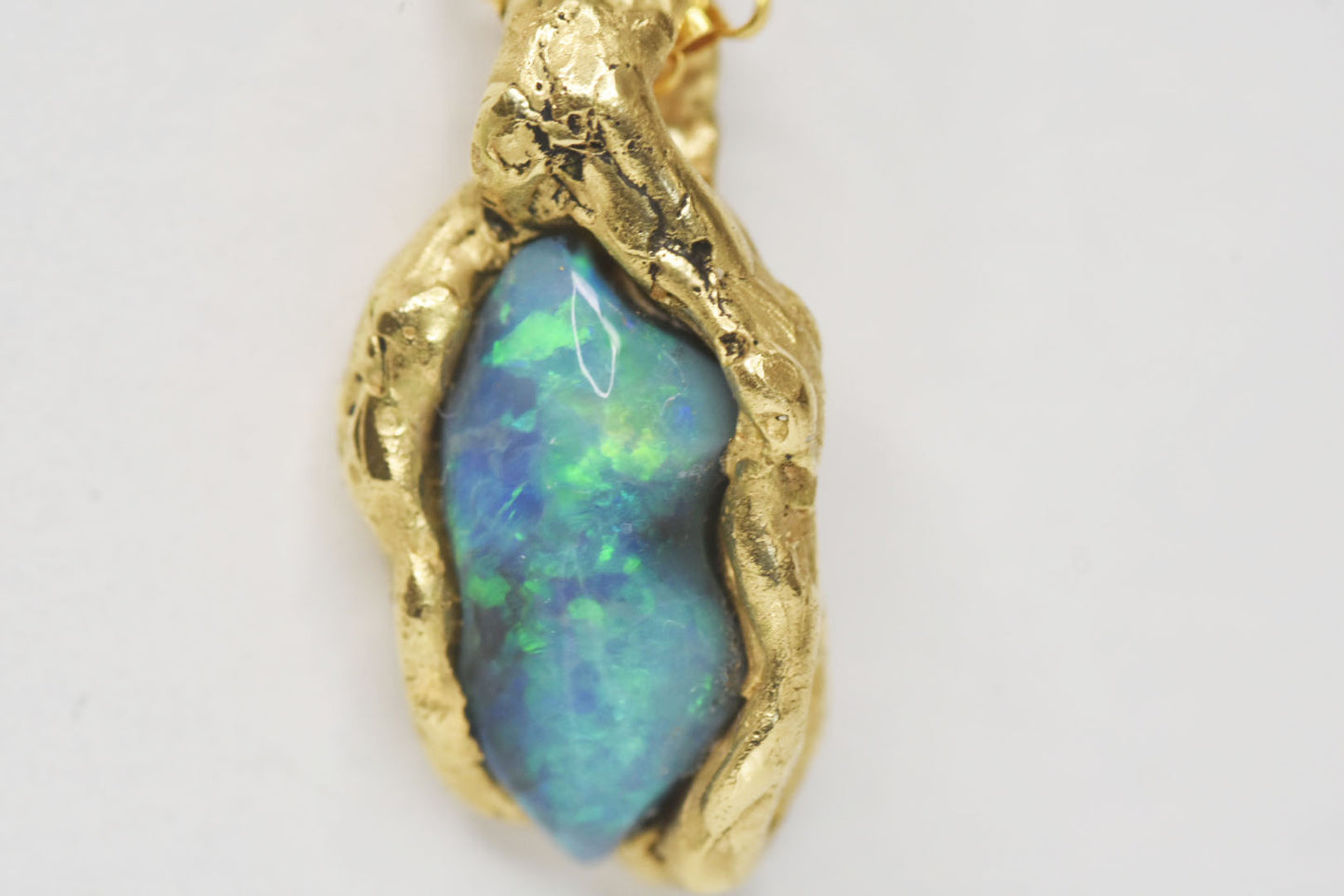 1.15ct Black Opal, White Diamond and Sapphire pendant, 18k Yellow Gold. St Ives, Cornwall.
