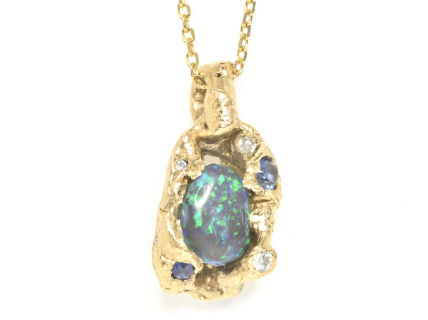 2.4 ct Black Opal, White Diamond, Cognac Diamond and Sapphire Ring. 18k Yellow Gold Pendant. Western Cliffs of Swanage.
