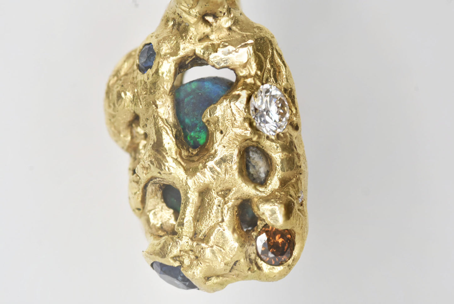 2.4 ct Black Opal, White Diamond, Cognac Diamond and Sapphire Ring. 18k Yellow Gold Pendant. Western Cliffs of Swanage.