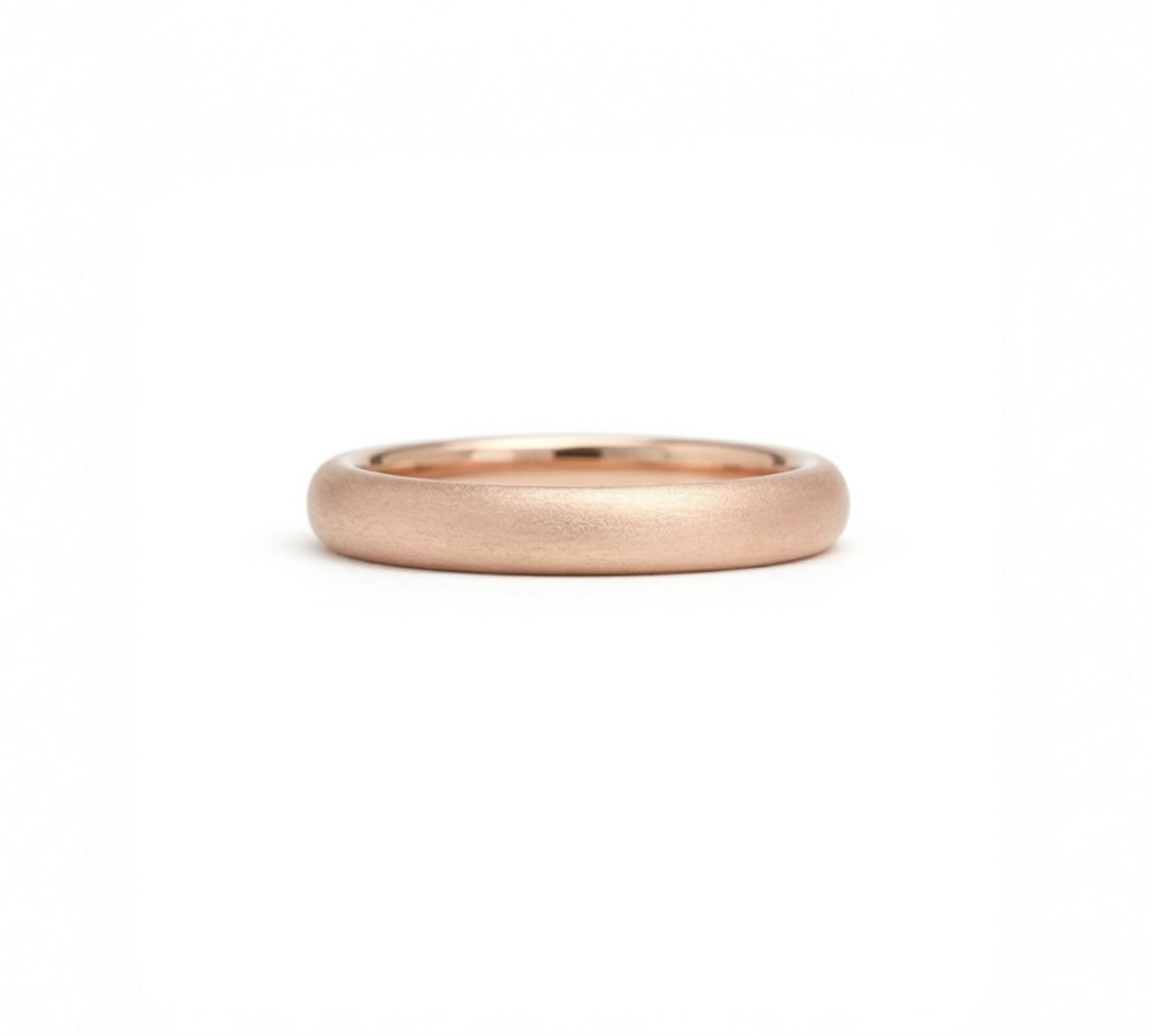 Rose gold wedding band made in Cornwall. 