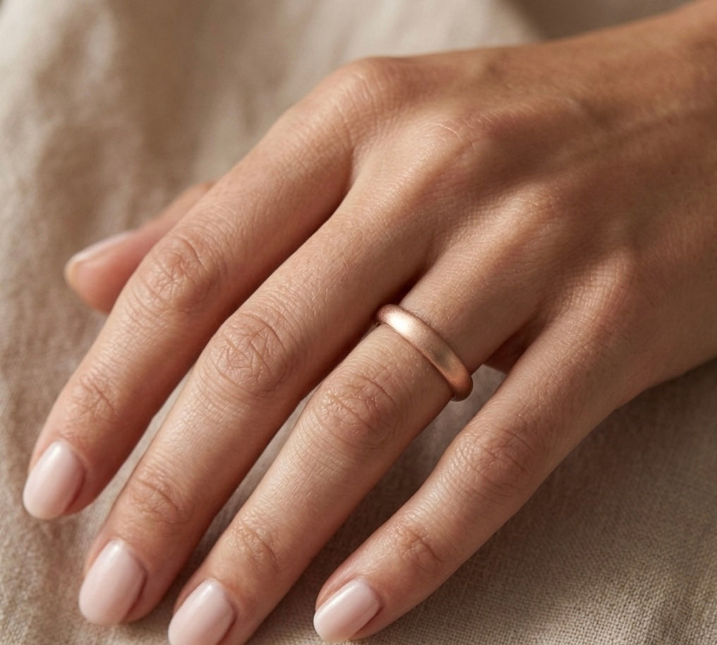 Rose gold wedding ring made on a Cornish beach. 