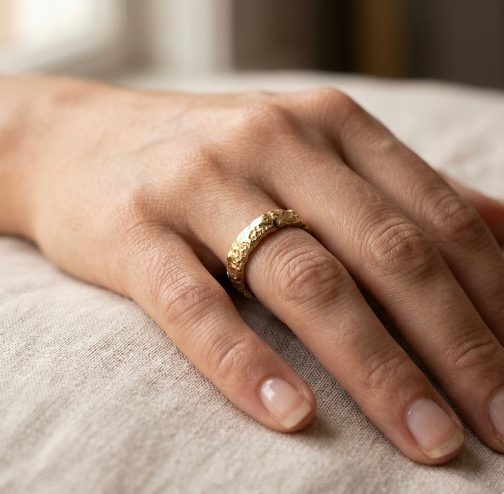 Organic gold wedding band made outdoors in st Ives Cornwall. Shem Hake jewellery