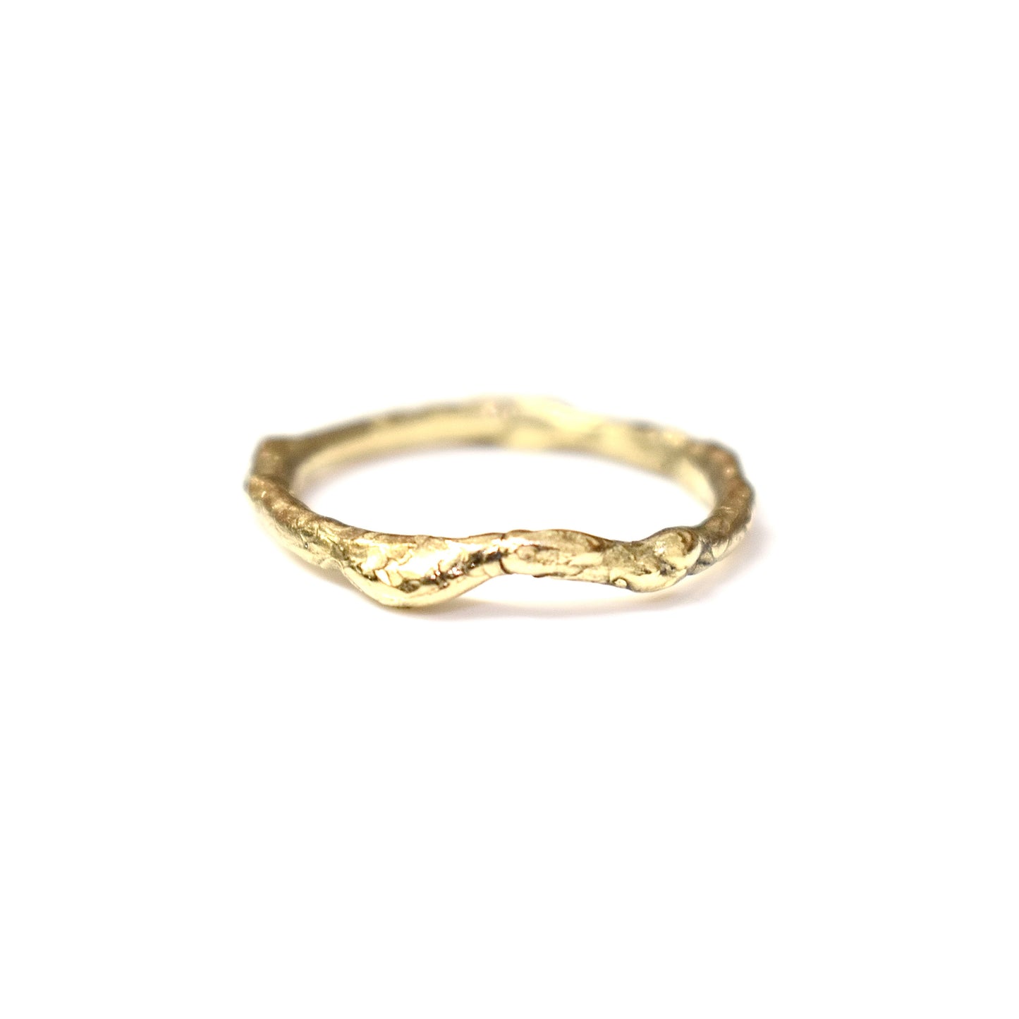 Organic gold wedding ring made outdoors in st Ives Cornwall. Shem Hake jewellery. 