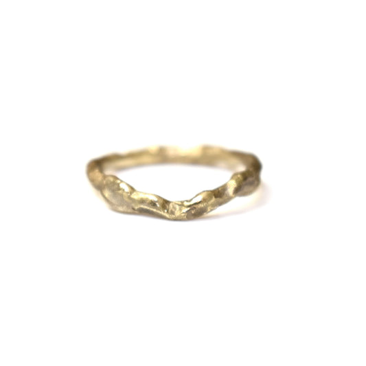Organic gold wedding ring made outdoors in st Ives Cornwall. Shem Hake jewellery. 
