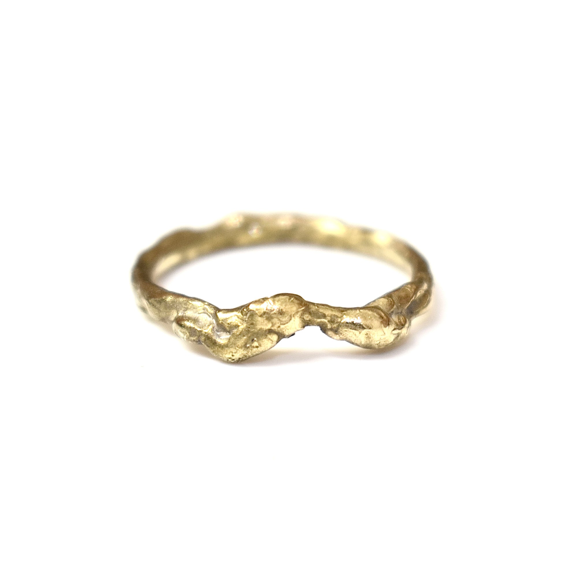 Organic gold wedding band made outdoors in st Ives Cornwall. Shem Hake jewellery