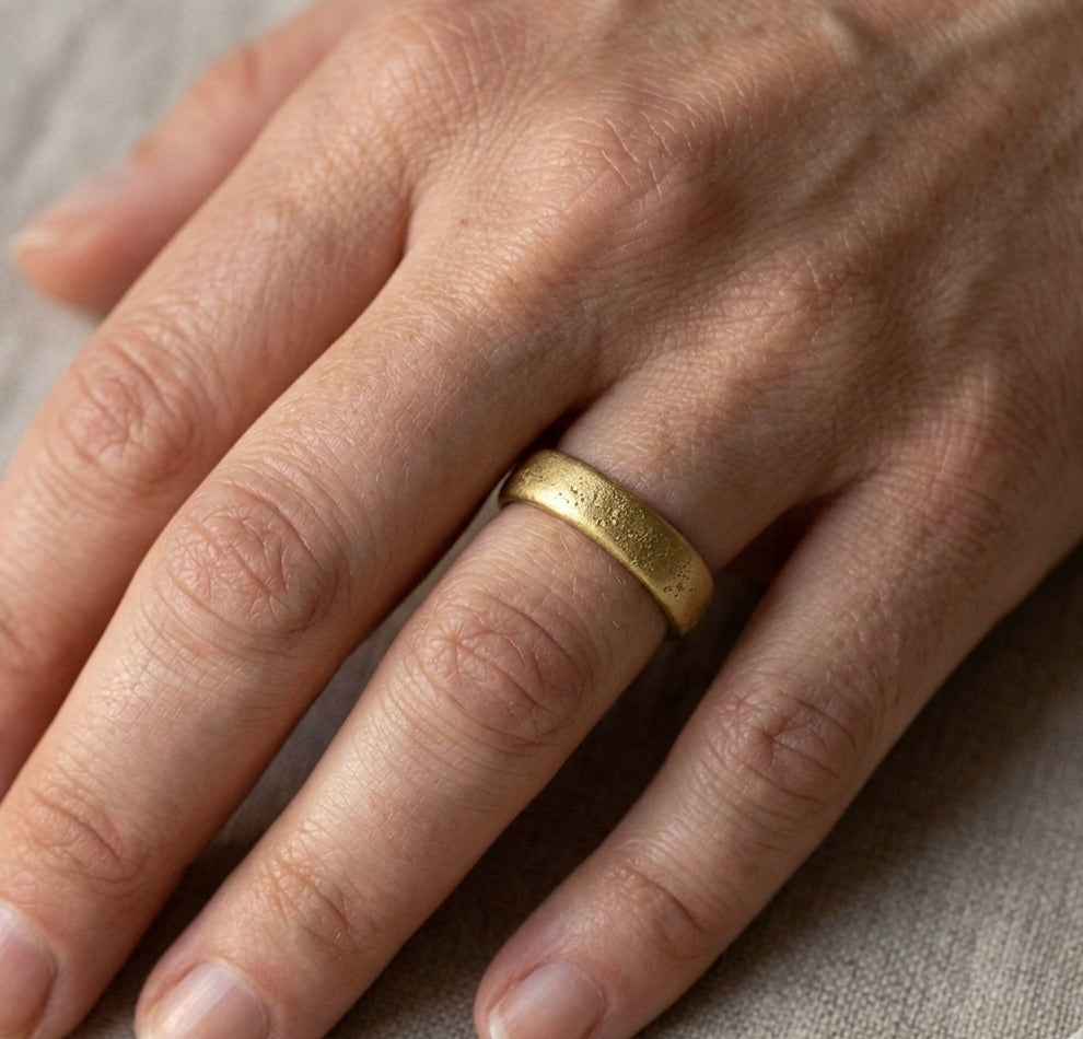 Gold sand cast wedding ring made in Cornwall. Shem Hake Jewellery. 