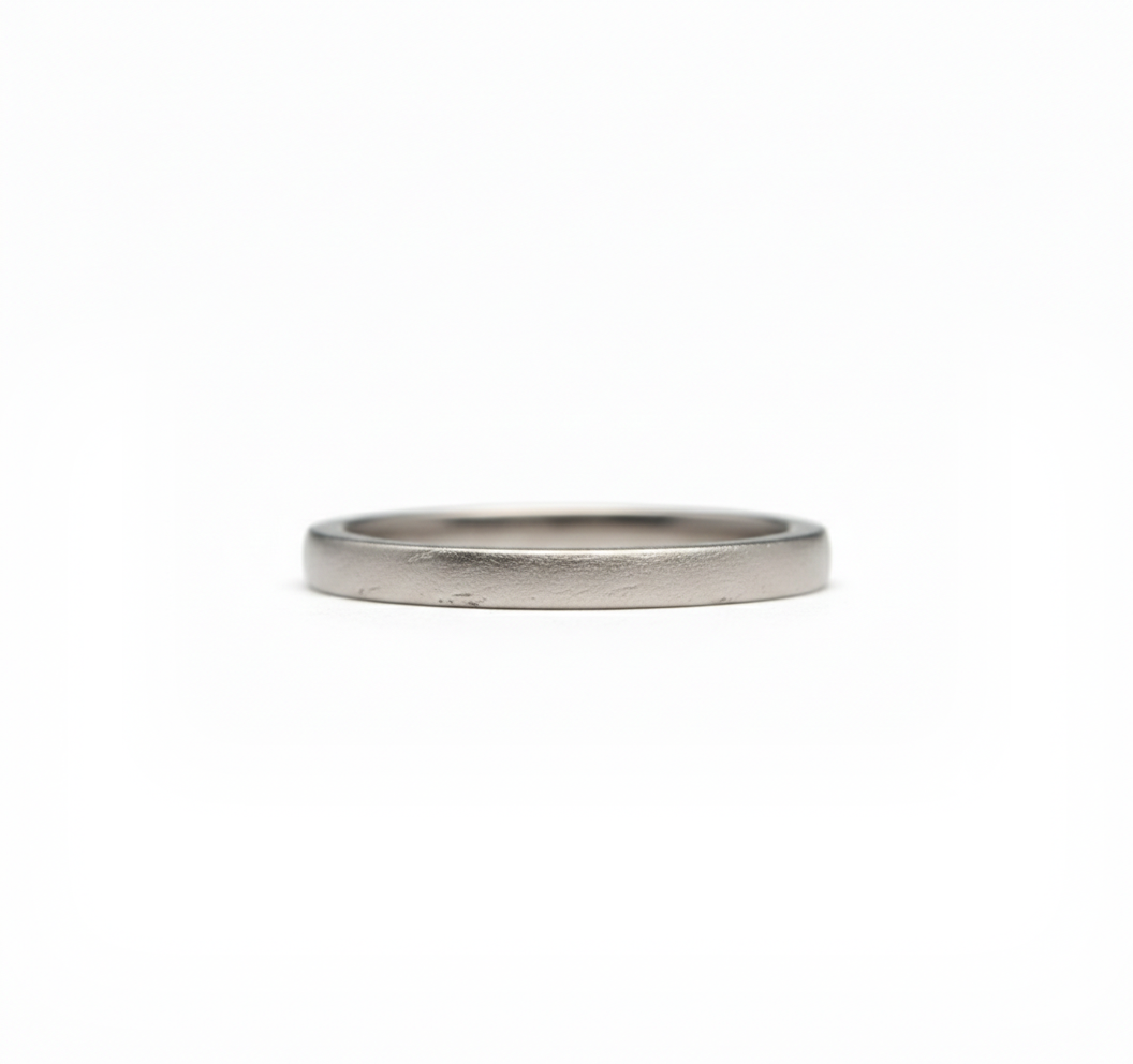 Silver wedding band casted on a Cornish beach. 