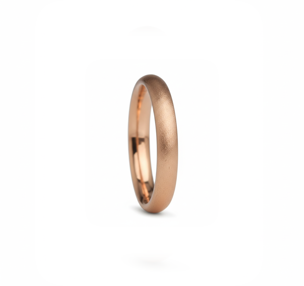 Sand casted rose gold wedding band. 