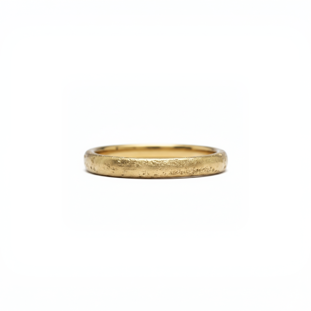 Yellow gold wedding ring cast on A Cornish beach 