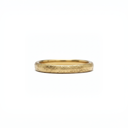 Yellow gold wedding ring cast on A Cornish beach 
