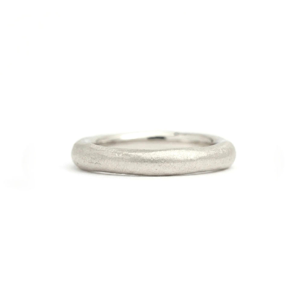 White gold wedding ring made in Cornwall on the beach. 