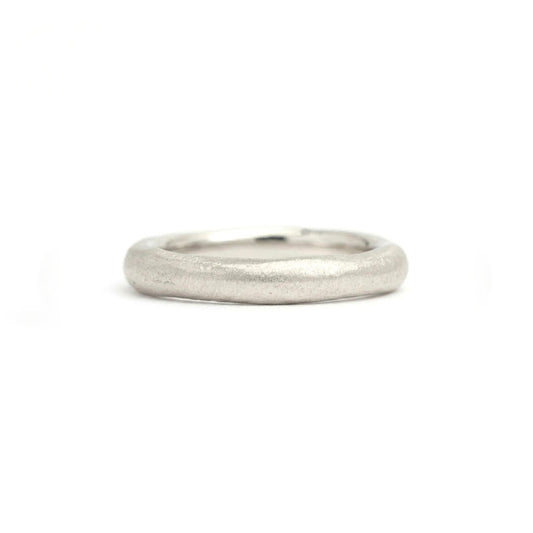 White gold wedding ring made in Cornwall on the beach. 