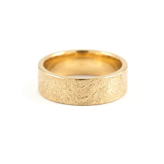 Gold textured wedding ring made in Cornwall. 