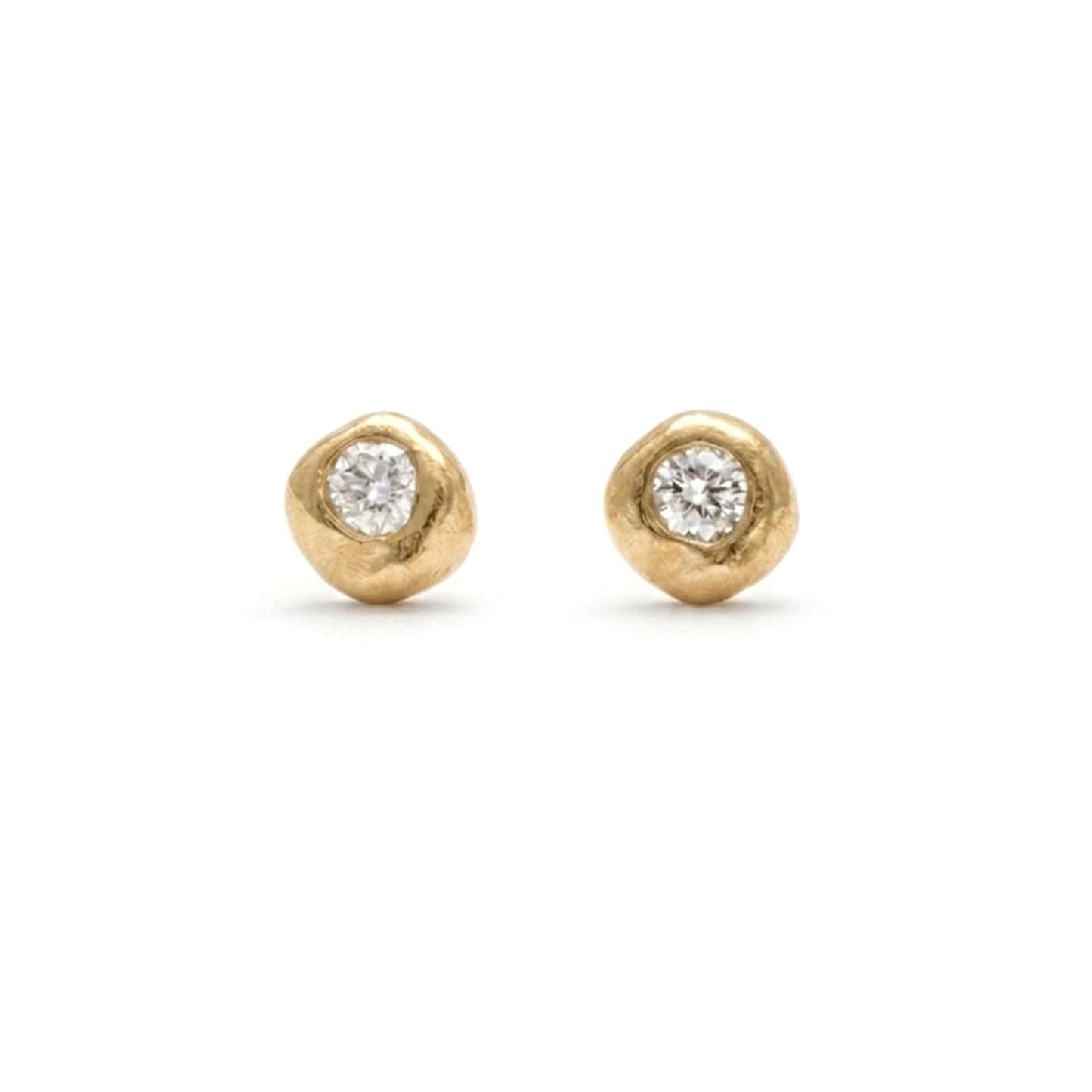 Gold earring studs cast near the summit of Mam Tor, the Peak District. Shem Hake Jewellery. 