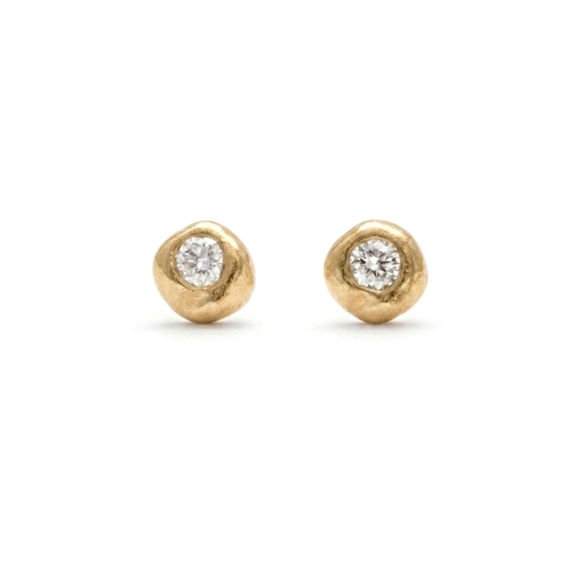 Gold earring studs cast near the summit of Mam Tor, the Peak District. Shem Hake Jewellery. 